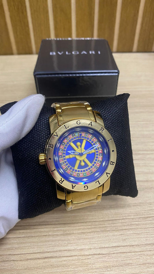 RELOGIO BVGARI DOURADO\AZUL ROLETA